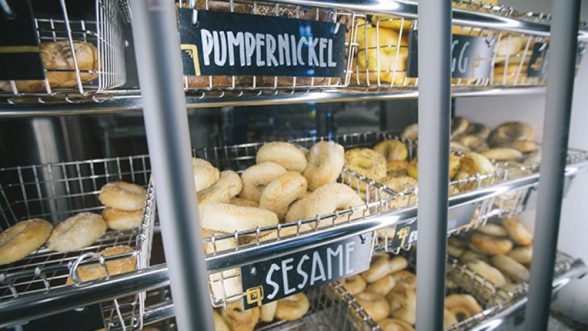 CU Denver alumnus Josh Pollack uses a high-tech water filtration machine to give his bagels an authentic New York-style texture and flavor.