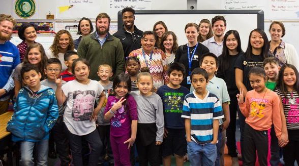 David Bruton reading to kids