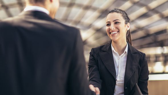 Business colleagues shaking hands