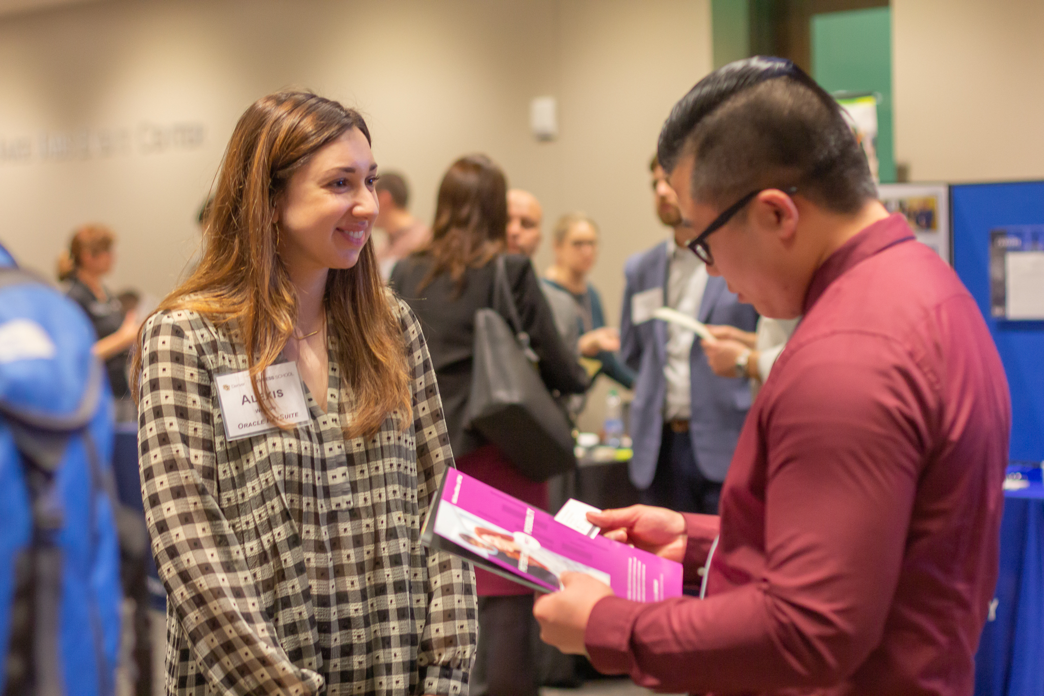 Student talking with employer