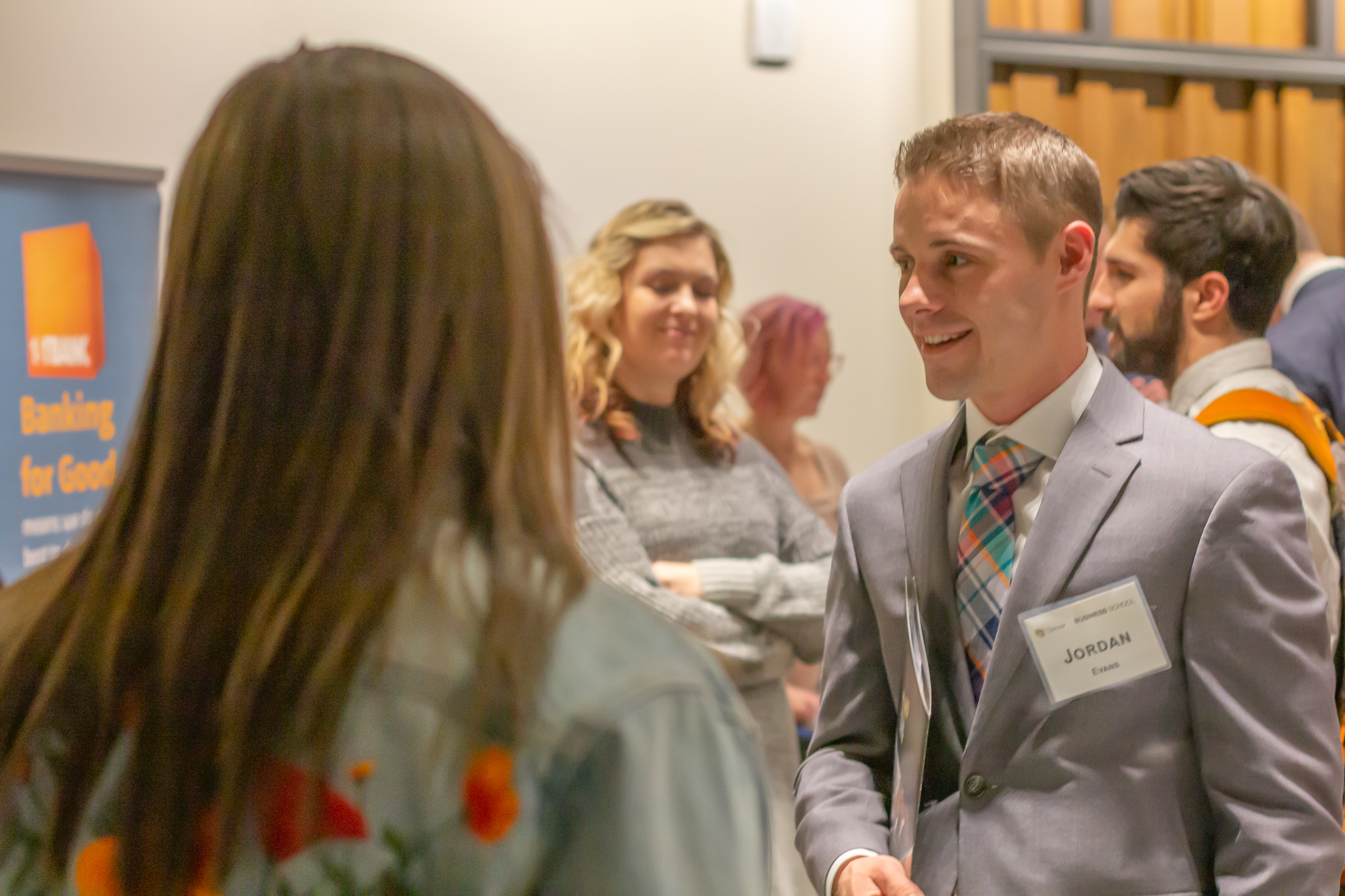 Student talking with employer