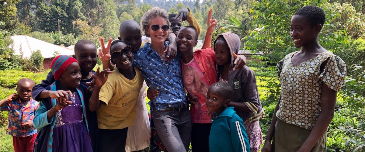 Professional MBA student, Mimi with a group of girls in Kenya and currently studying sustainable management