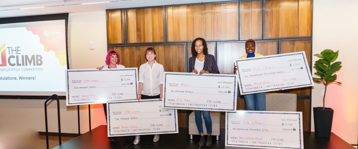 Winners of THE CLIMB Startup Pitch Competition posing with their respective prizes. From left to right are: STR Linens team, 2nd place winner, Maluti, 1st Place Winner, and File l'Espoir Best Healthcare and Mission Driven Award Winner