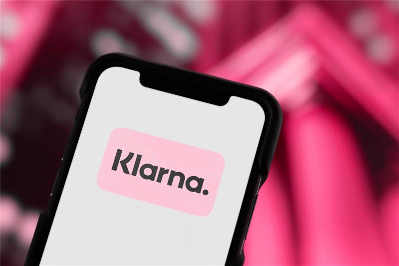 Image of phone showing Klarna, a major Fintech company.